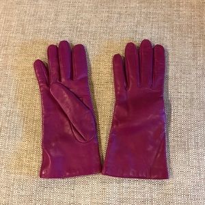 Neiman Marcus leather magenta gloves. Never worn.